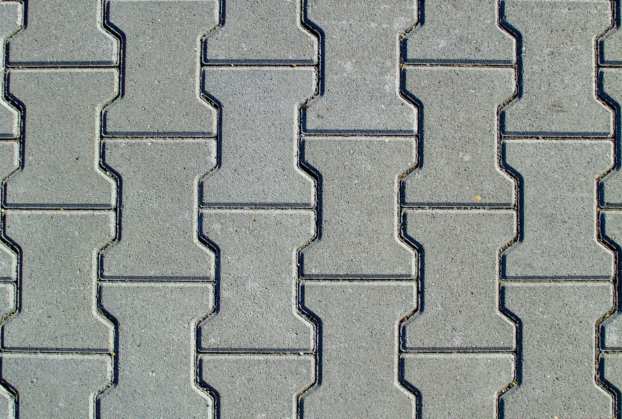 Texture of concrete pavement or sidewalk with paving slabs